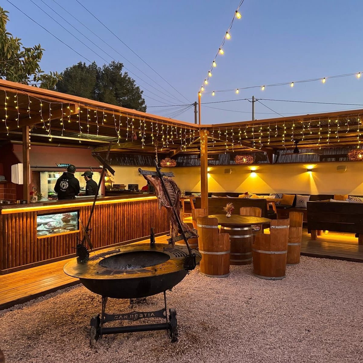 Can Bestia restaurant glowing at dusk